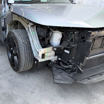 Customer's car with front-end collision damage